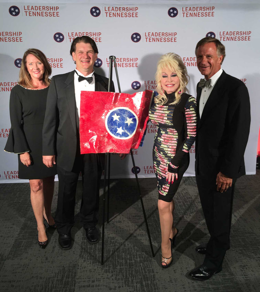 Dolly Parton with Tennessee State Flag.  Enamel and Copper by artist Ben Caldwell